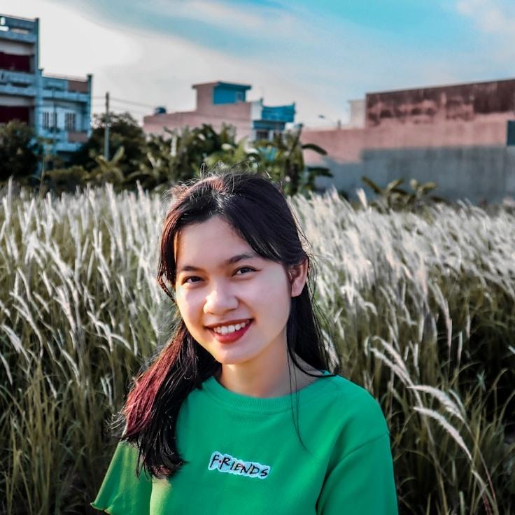 Portrait of Amara Chen, group coordinator and fusion cooking expert